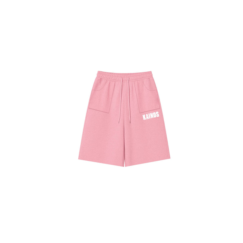Pink cotton sweat shorts with a drawstring waist and KAINOS embroidered in white on the leg