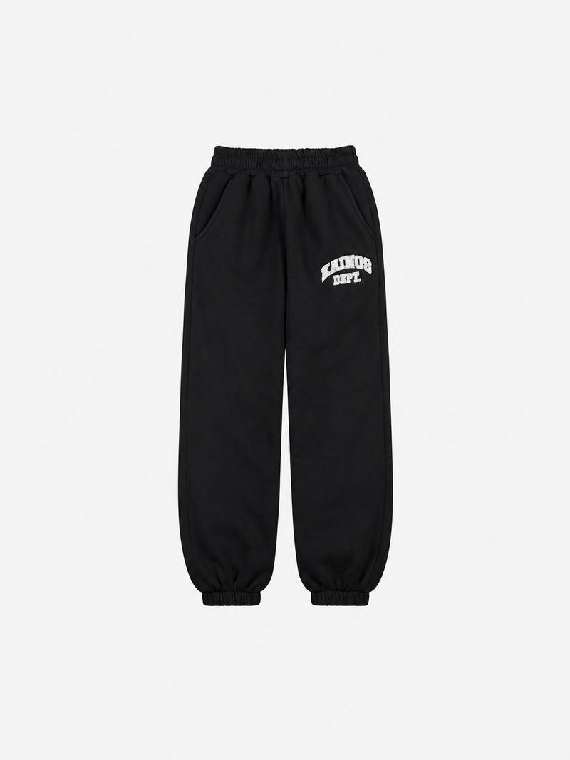 Black sweatpants with elastic cuffed ankles and KAINOS DEPT. in white varsity lettering on the thigh