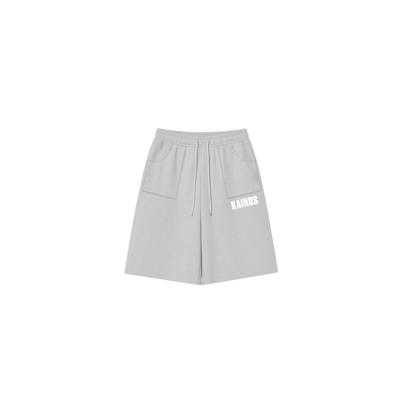 Light grey cotton sweat shorts with KAINOS embroidered in white on the leg