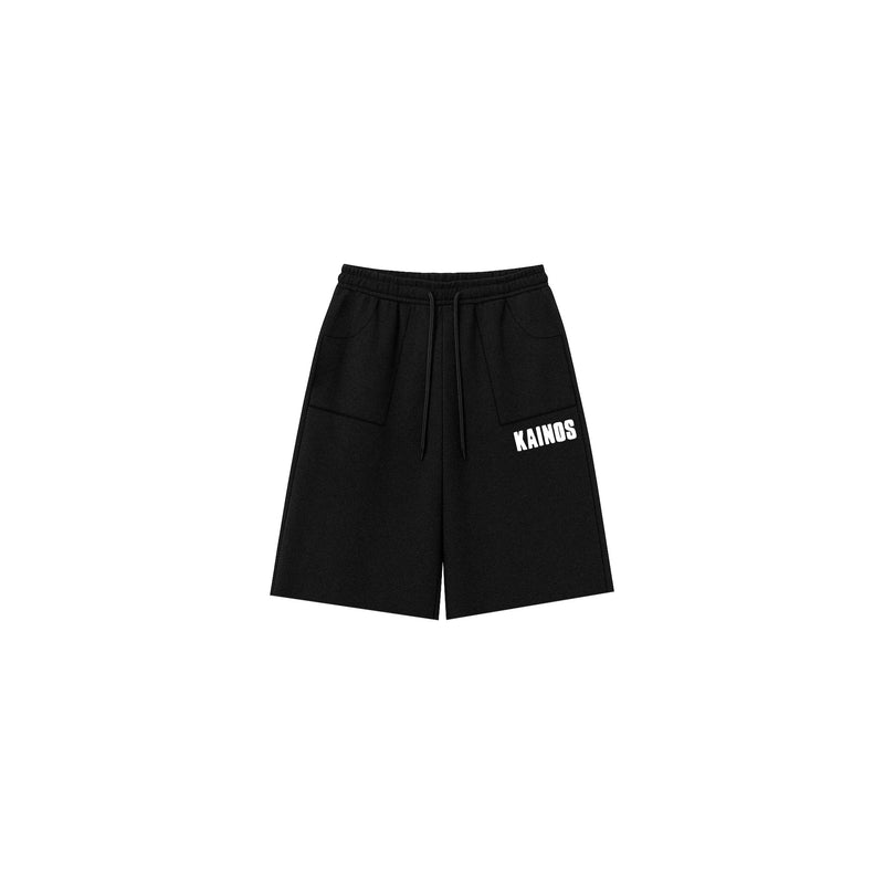 Black cotton sweat shorts with KAINOS embroidered in white on the leg