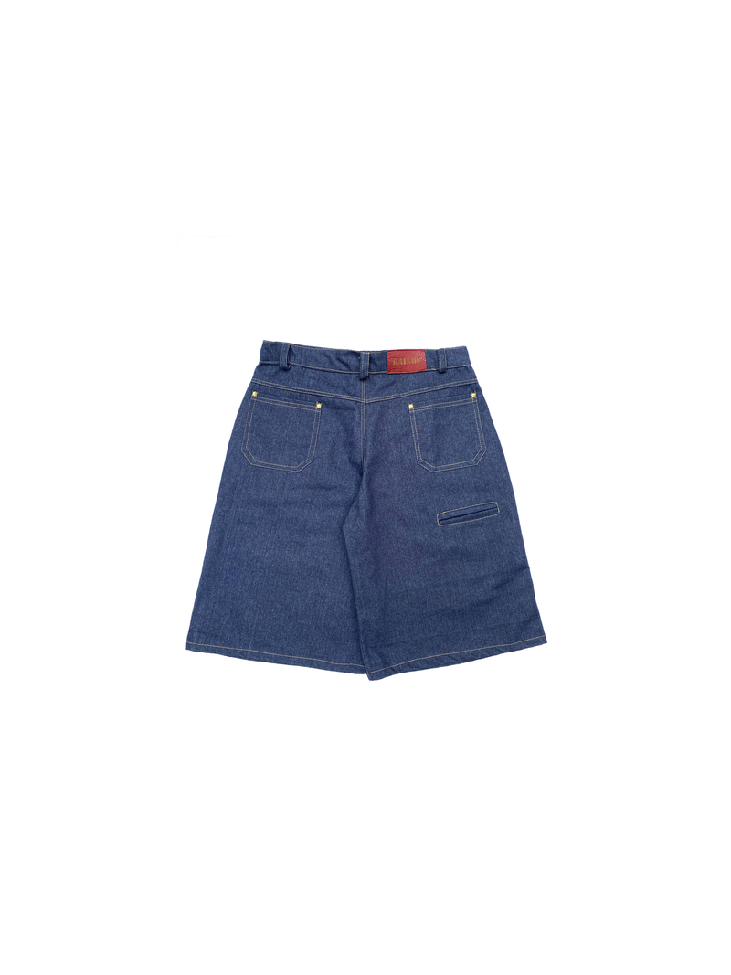 Back of the indigo baggy denim shorts with a red KAINOS tab at the waistband